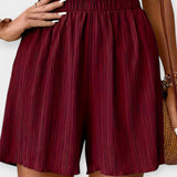 Nina - Shorts di stile con pieghe frontali