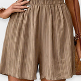 Nina - Shorts di stile con pieghe frontali