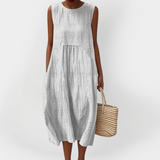 Abito elegante in cotone senza maniche con tasche