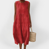 Abito elegante in cotone senza maniche con tasche
