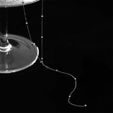 Collana con frange sulle clavicole