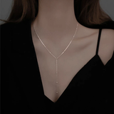 Collana con frange sulle clavicole
