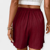 Nina - Shorts di stile con pieghe frontali