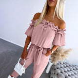 Nicoletta - Tuta elegante con spalle scoperte e laccio in vita